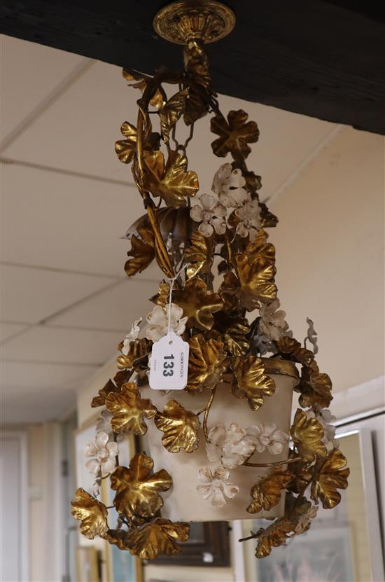 A gilt metal floral light fitting